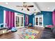 Bright living room featuring hardwood floors, vaulted ceilings, many windows, and backyard access at 92 Creek Front Way, Lawrenceville, GA 30043