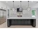 Modern kitchen with stainless steel appliances, black cabinetry, and a large center island at 2728 Talley Ln, Buford, GA 30519