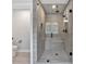 Contemporary bathroom with glass-enclosed shower and modern tile at 7474 Waterview Cv, Douglasville, GA 30135