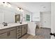 Bathroom with double vanity, modern fixtures, and tiled floors at 7474 Waterview Cv, Douglasville, GA 30135