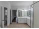 Elegant bathroom features a double sink vanity with modern fixtures and a glass shower at 1209 Fenmore Hall Dr, Powder Springs, GA 30127