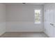 Bright bedroom features a window with a view and a closet for optimal storage at 1209 Fenmore Hall Dr, Powder Springs, GA 30127