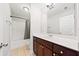 Bathroom featuring a shower-tub combo and vanity at 1765 Stoney Creek Se Dr, Atlanta, GA 30316