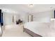 Bright bedroom with neutral carpet has office area with desk, and 2 windows provides space to work and rest at 1765 Stoney Creek Se Dr, Atlanta, GA 30316