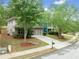 Charming two-story home with a well-manicured lawn, mature trees, and a driveway leading to a two-car garage at 1765 Stoney Creek Se Dr, Atlanta, GA 30316