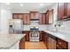 Bright kitchen featuring granite countertops, stainless appliances, and ample storage at 1765 Stoney Creek Se Dr, Atlanta, GA 30316