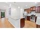 Open kitchen with island, stainless steel appliances, and granite countertops at 1765 Stoney Creek Se Dr, Atlanta, GA 30316