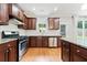 Updated kitchen featuring a gas range, stainless appliances, granite counters and stylish cabinetry at 1765 Stoney Creek Se Dr, Atlanta, GA 30316
