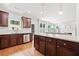 Bright kitchen features stainless steel appliances, granite countertops, and dark wood cabinetry at 1765 Stoney Creek Se Dr, Atlanta, GA 30316