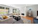 Bright and airy living room with fireplace and view to the backyard at 1765 Stoney Creek Se Dr, Atlanta, GA 30316