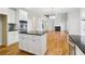This bright kitchen is situated next to a fireplace and features stainless steel appliances at 2620 Bent Creek Dr, Cumming, GA 30041