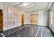 Partially finished basement with painted floor, covered walls, and unfinished framing at 2620 Bent Creek Dr, Cumming, GA 30041