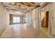 Unfinished basement with concrete floor, exposed ceiling, and stairway access at 2620 Bent Creek Dr, Cumming, GA 30041