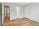 A bedroom with neutral walls and attractive wood-look floors at 2620 Bent Creek Dr, Cumming, GA 30041