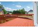 Wooden deck offering serene views of the surrounding neighborhood and lush trees at 2620 Bent Creek Dr, Cumming, GA 30041