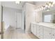Large main bathroom with double vanity sinks, soaking tub, and tile flooring at 2620 Bent Creek Dr, Cumming, GA 30041