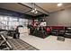 A spacious garage that has dark grey painted walls and has some storage space available at 3877 Valley Bluff Ln, Snellville, GA 30039
