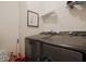Functional laundry room with modern appliances and a practical design for efficient laundry tasks at 3877 Valley Bluff Ln, Snellville, GA 30039