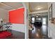 Open-concept living area featuring dark hardwood floors and an archway leading to a cozy sitting room at 3877 Valley Bluff Ln, Snellville, GA 30039