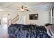 Living room featuring a coffered ceiling and direct view to the staircase at 3877 Valley Bluff Ln, Snellville, GA 30039