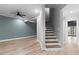 A finished basement featuring a staircase at 5106 Davis Love Dr, Cumming, GA 30041