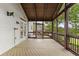 Relax on this spacious screened porch and enjoy access to the backyard at 5106 Davis Love Dr, Cumming, GA 30041