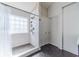 Modern bathroom featuring large tiled walk-in shower with a large window at 1542 Armende Cir, Dacula, GA 30019