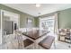 Bright dining room with wooden table and bench seating, offering a cozy and inviting atmosphere at 1542 Armende Cir, Dacula, GA 30019