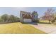 Well-maintained two-story home with a lush lawn and a classic suburban aesthetic at 1542 Armende Cir, Dacula, GA 30019