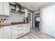Modern kitchen features white cabinets, wood countertops, subway tile backsplash and stainless steel appliances at 1542 Armende Cir, Dacula, GA 30019