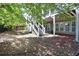 Backyard with deck featuring stairs and a fenced-in yard at 2248 Fort Se Dr, Smyrna, GA 30080