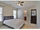 Comfortable bedroom with plush carpeting, a large bed, and a dresser with mirror at 2248 Fort Se Dr, Smyrna, GA 30080