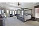 Spacious main bedroom with a tray ceiling and sitting area at 2248 Fort Se Dr, Smyrna, GA 30080