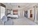 Spacious main bedroom with a tray ceiling and access to ensuite bathroom at 2248 Fort Se Dr, Smyrna, GA 30080