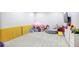 Playroom featuring fun decorations, colorful toys, a small tent, and a TV on the wall at 2248 Fort Se Dr, Smyrna, GA 30080