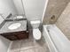 This bathroom features a double vanity, a comfort height toilet, and a tub/shower combination at 2470 Bridle Bridge Trl, Cumming, GA 30040