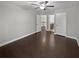Bedroom with hardwood flooring, ceiling fan and access to an ensuite bathroom at 2470 Bridle Bridge Trl, Cumming, GA 30040