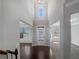 Inviting foyer with high ceilings, hardwood floors, and natural light at 2470 Bridle Bridge Trl, Cumming, GA 30040