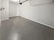 Spacious garage with sealed concrete flooring at 2470 Bridle Bridge Trl, Cumming, GA 30040