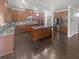 Modern kitchen with granite countertops, stainless steel appliances, and ample cabinet space at 2470 Bridle Bridge Trl, Cumming, GA 30040