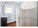 Bathroom with tiled shower and glass door at 2634 Charlesgate Ave, Decatur, GA 30030