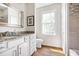 Bathroom with a granite vanity and a tile and glass shower at 2634 Charlesgate Ave, Decatur, GA 30030