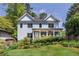 Inviting two-story home with covered porch and a well-manicured lawn at 2634 Charlesgate Ave, Decatur, GA 30030
