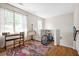 Landing with hardwood floors, large windows, and an interesting rug at 2634 Charlesgate Ave, Decatur, GA 30030