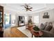 Bright and inviting living room with hardwood floors and a ceiling fan at 2634 Charlesgate Ave, Decatur, GA 30030