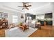 Open floor plan with kitchen view from living room with hardwood floors at 2634 Charlesgate Ave, Decatur, GA 30030