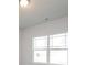 Bright bedroom featuring a double window and neutral paint, creating a serene and inviting atmosphere at 267 Eason St, Bowdon, GA 30108
