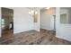 Dining room with hardwood floors and classic wainscoting detail at 267 Eason St, Bowdon, GA 30108
