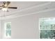 Bright and airy living room with tray ceiling, recessed lighting, and double windows, offering ample natural light at 267 Eason St, Bowdon, GA 30108