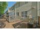 Spacious backyard with multiple decks and seating area perfect for relaxing at 384 Parc River Blvd, Lawrenceville, GA 30046